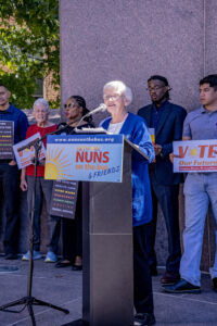 Sr. Alice Gerdeman, SC is the emcee at the Pittsburgh, PA Nuns on the Bus & Friends rally