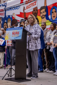 Joan F. Neal, NETWORK Deputy Executive Director and Chief Equity Officer opens the Nuns on the Bus tour at Love Park in Philadelphia, PA